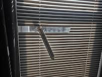 Broken blinds in most of the rooms.