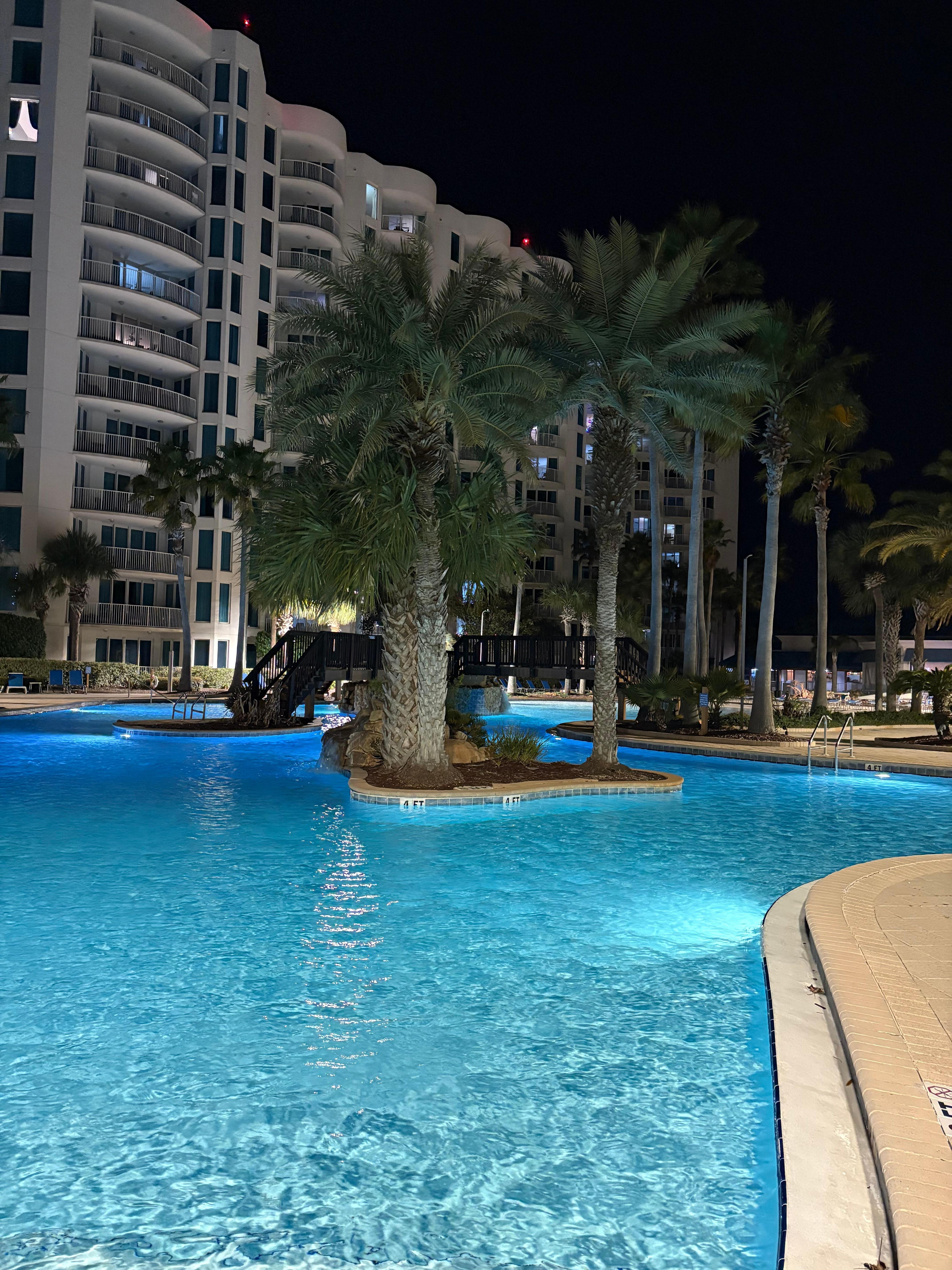 Beautiful main pool lit up at night