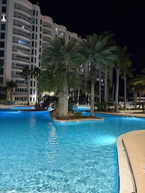 Beautiful main pool lit up at night