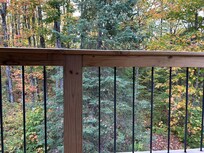 Off the upper balcony.