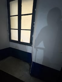 broken window in stairwell