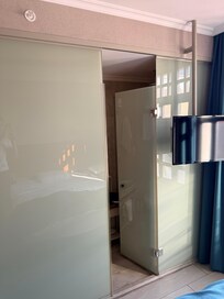 Toilet wall, there was no lights inside the shower cab.