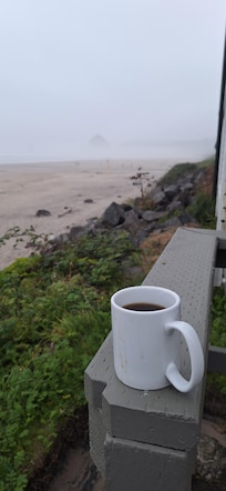 Sipping hot coffee on the beautiful beach