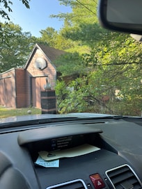 And this is the other side when you drive in. The shrubs cover up a lot of garbage