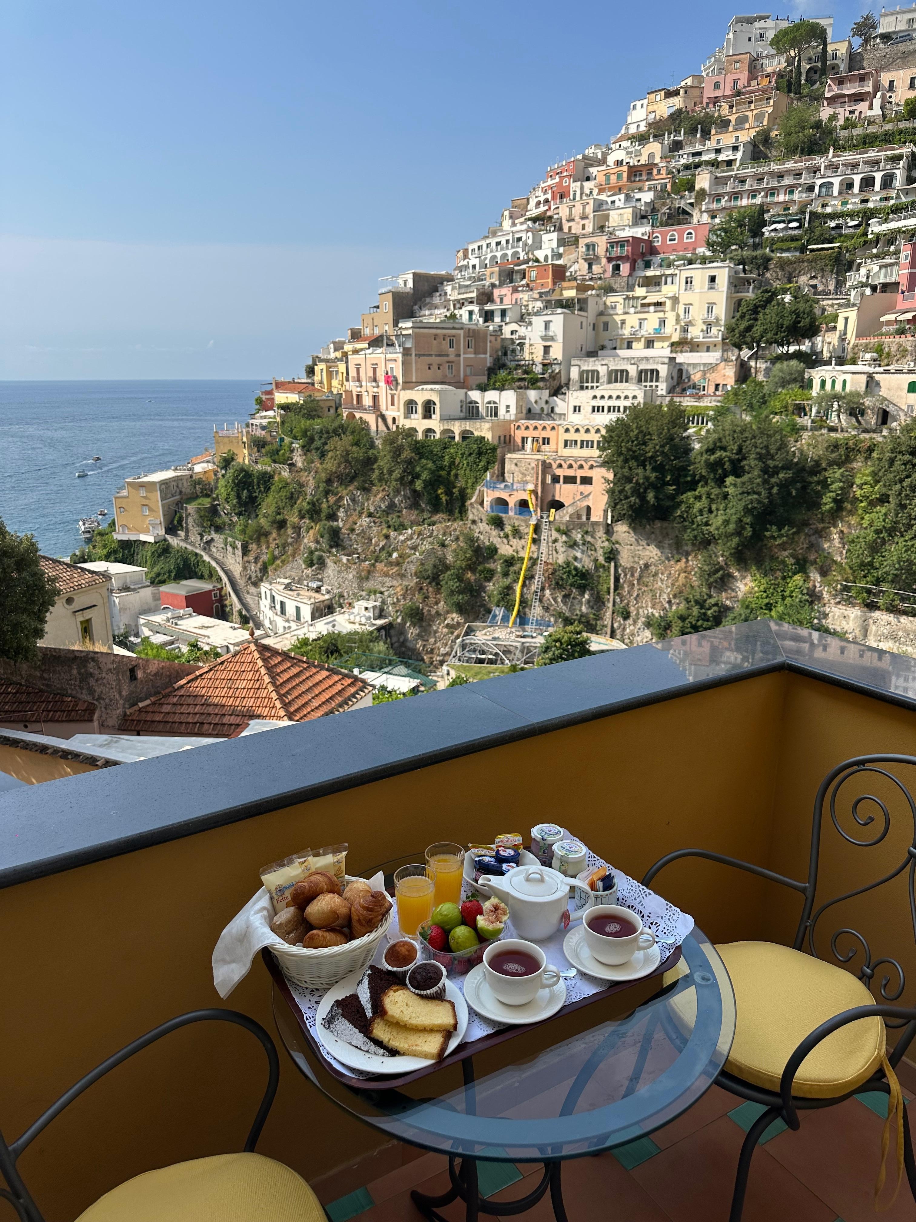 Balcony with view of town and sea