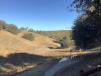 Beautiful view of vineyards behind home