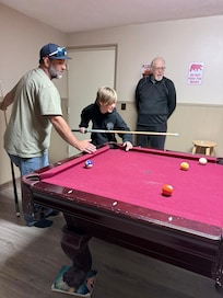 Three generations enjoying the cabin's amenities.