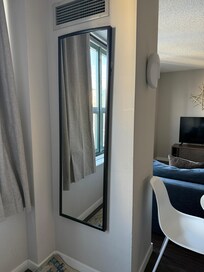 Mirror falling off the wall