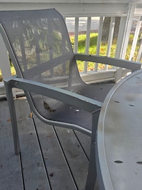 Filthy table, chairs and deck