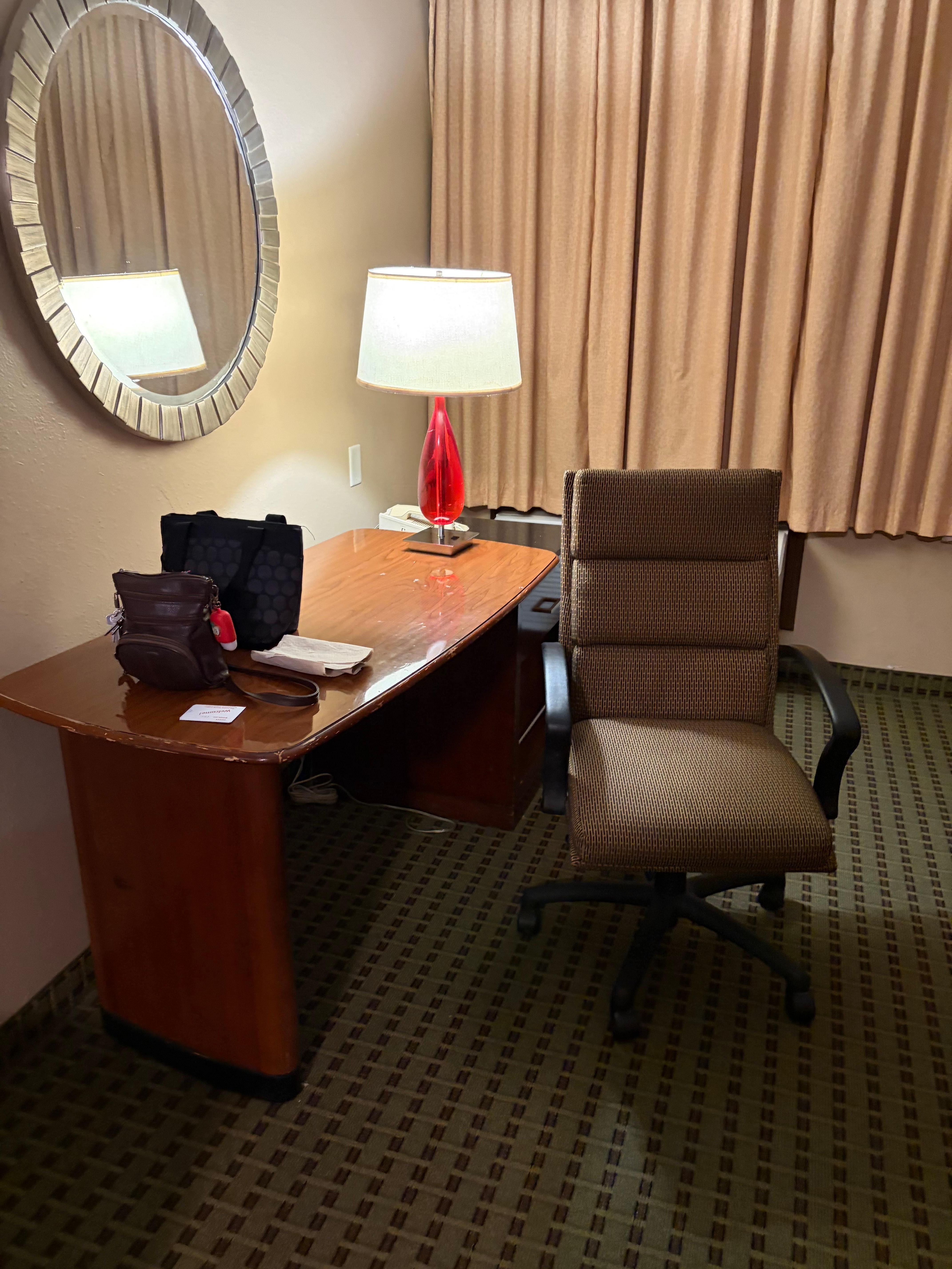 Food stains on the wall top of desk dirty carpet dirty 