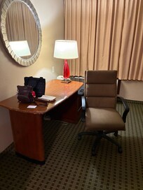 Food stains on the wall top of desk dirty carpet dirty