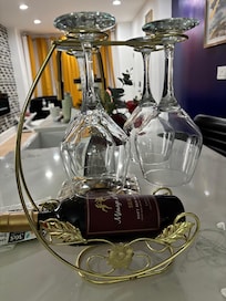 Wine glasses with wine and chocolate waiting for our arrival.