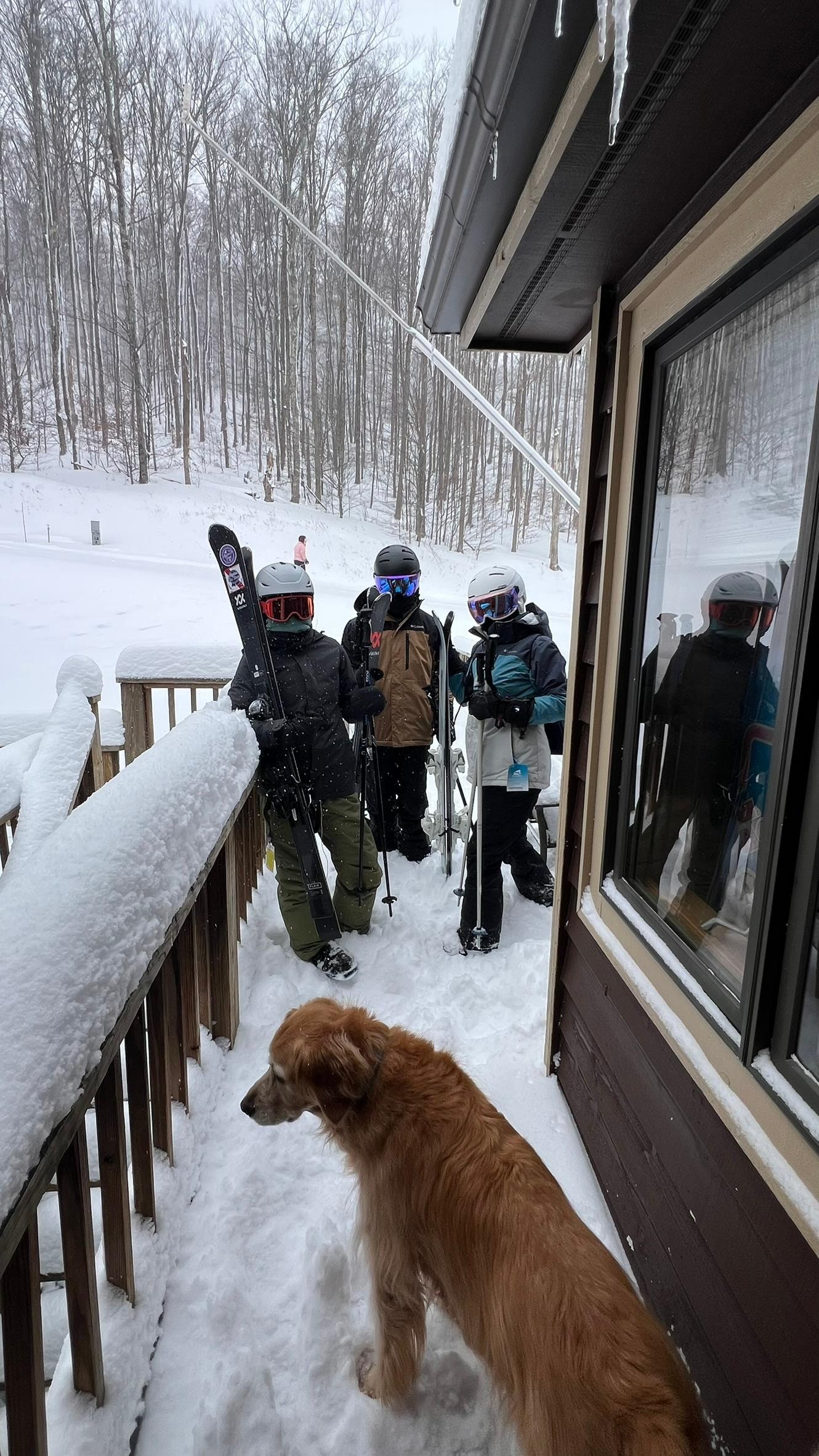 The crew headed out the walkway to the slopes.