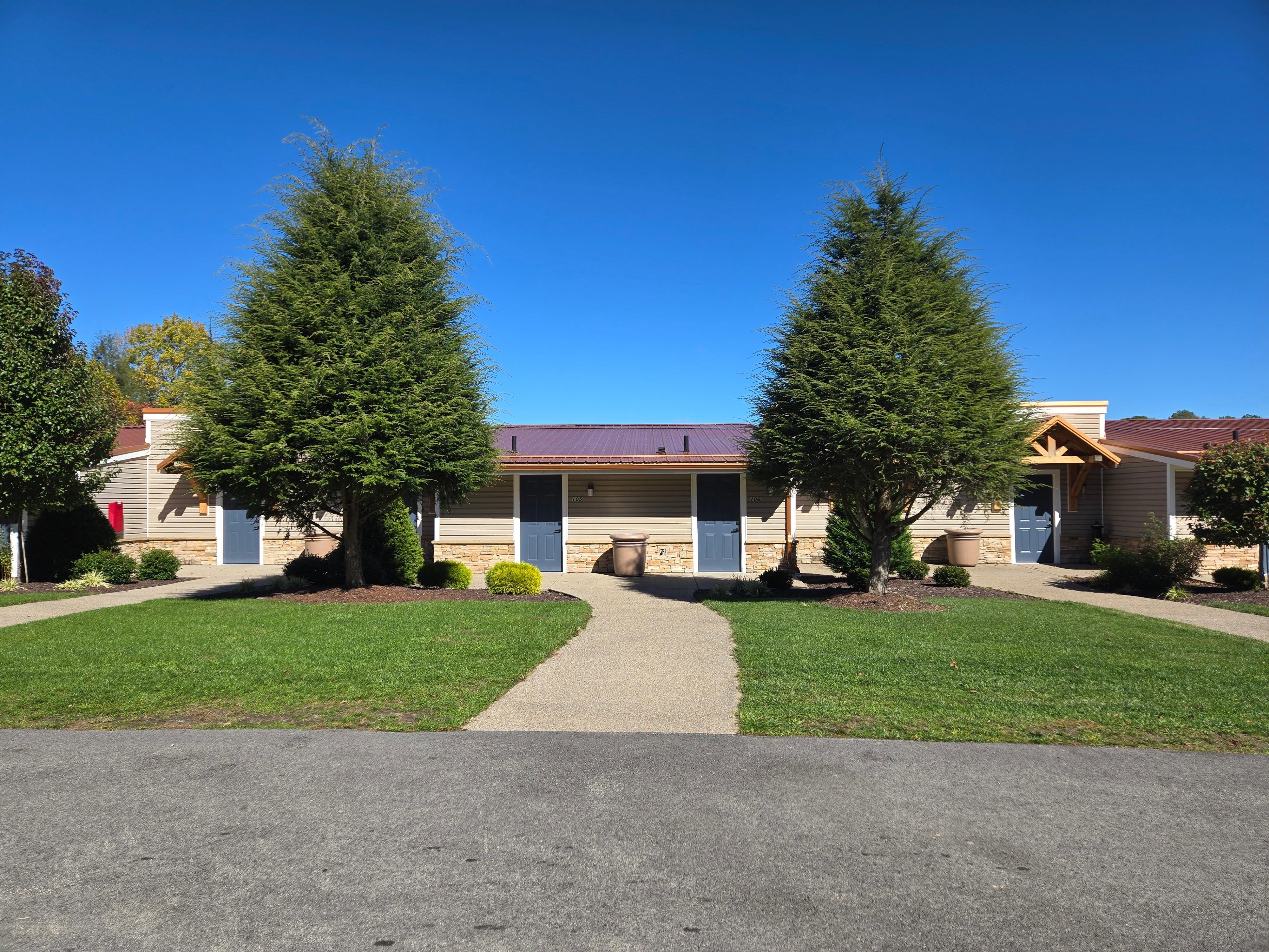 The lake is behind the building. Private patio for each unit.