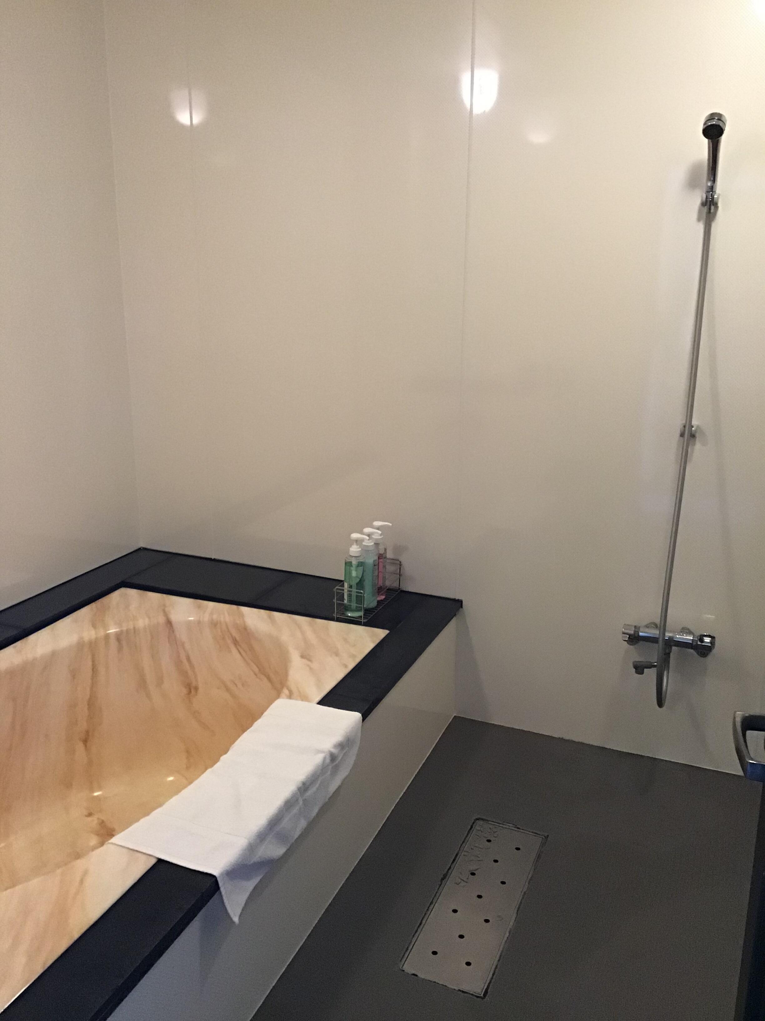 Great shower, and a deep bath, but intended to be used Japanese style So wash first, shower off soap, then have a soak.