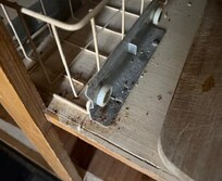 Dirty cabinets throughout the kitchen.