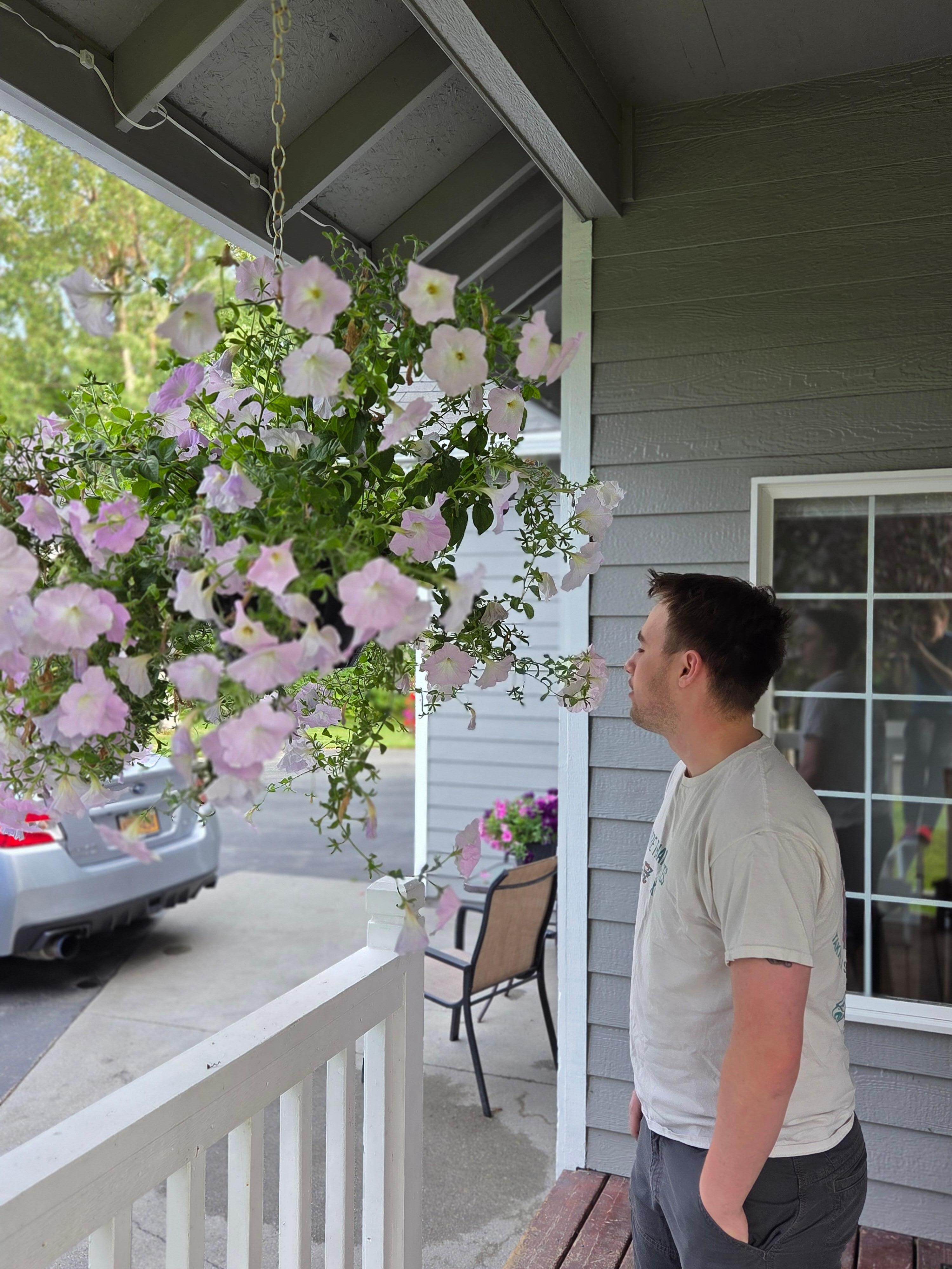 Flowers on the porch where we sat that were watered throughout stay while we were sitting under them