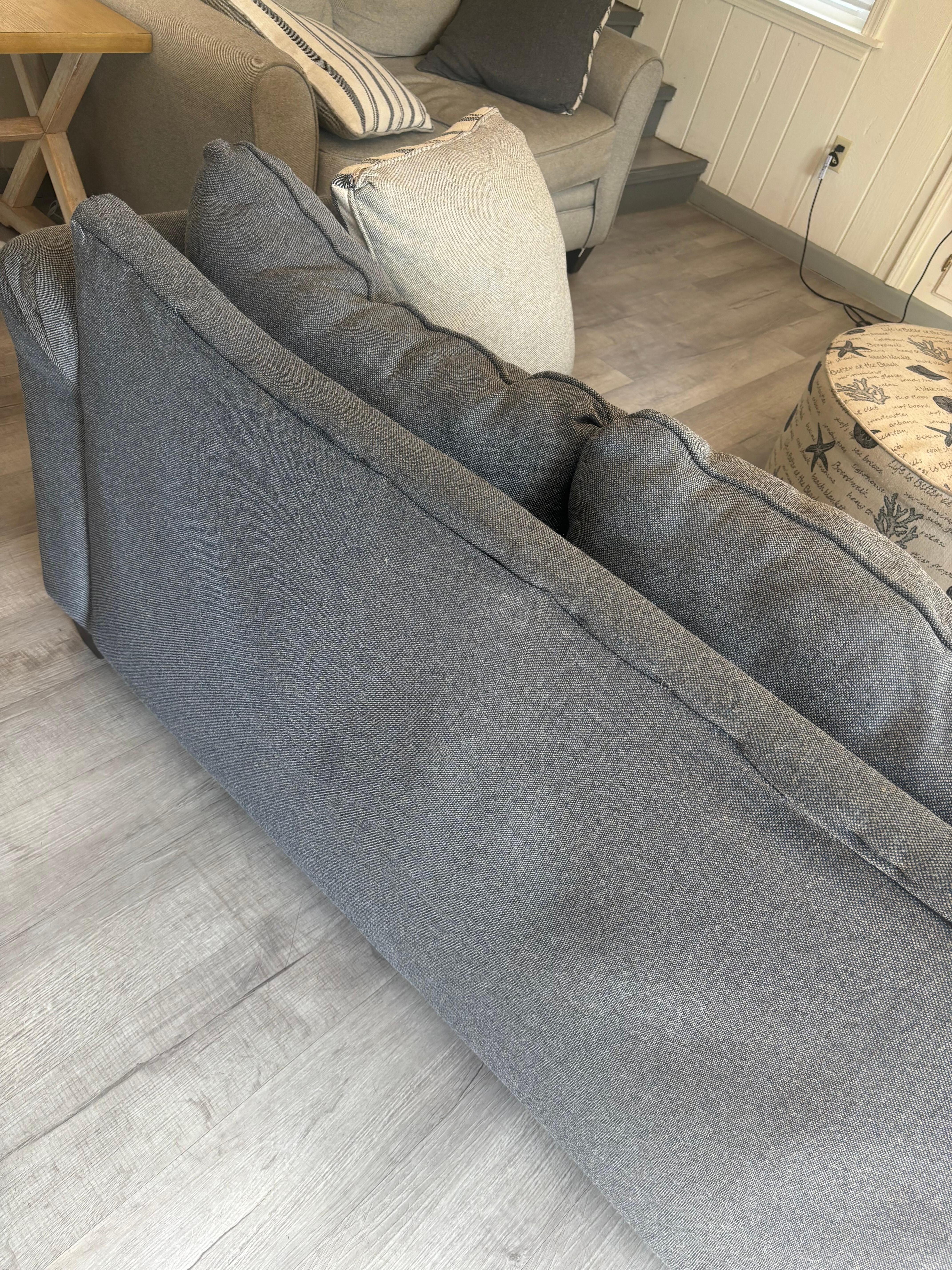 Visibly broken couch. Worn out and dirty. 