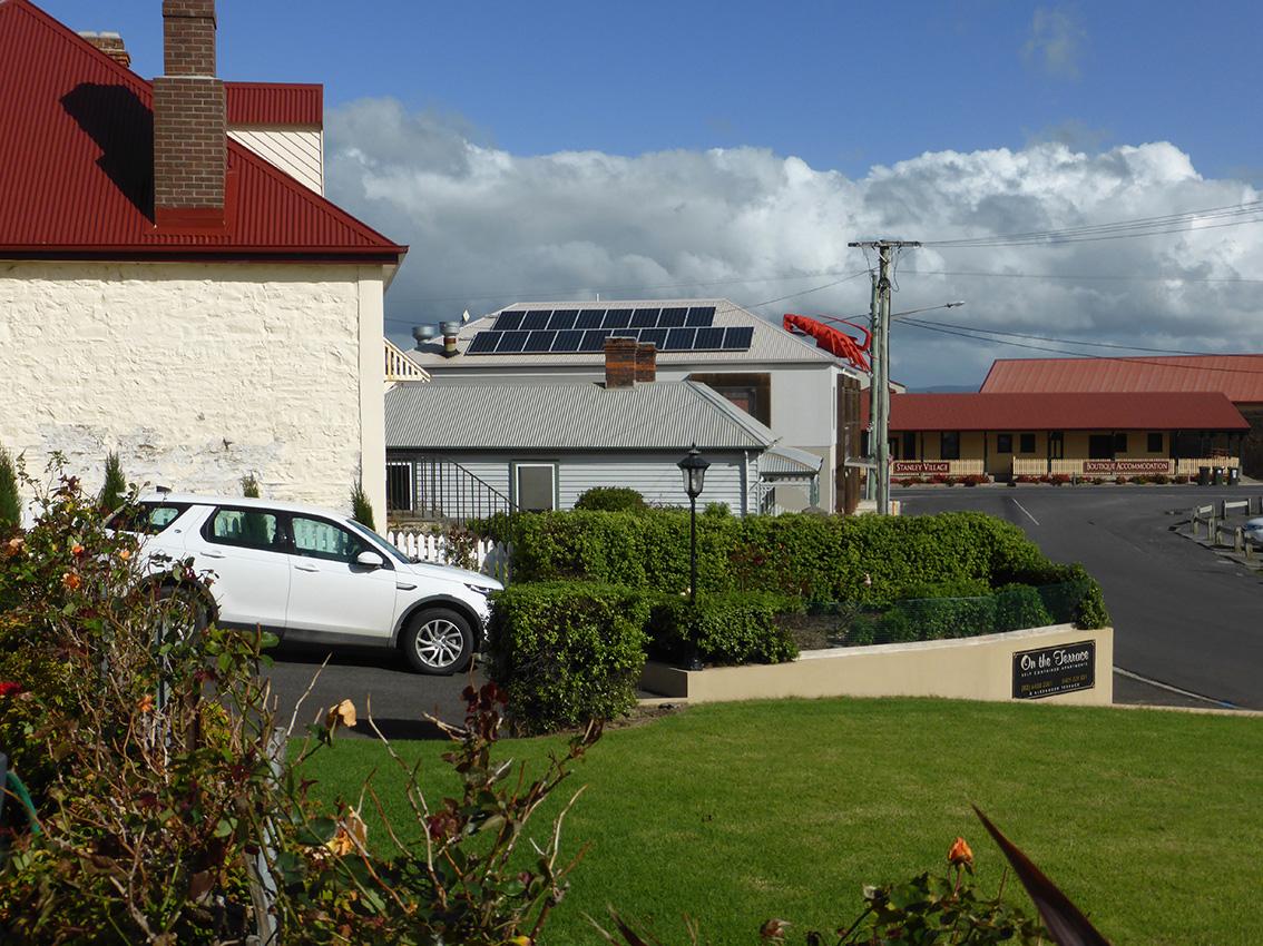 View across the front lawn and car parking at OTT toward the docks end of town