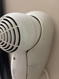 Hair and thick dirty scum on blow dryer