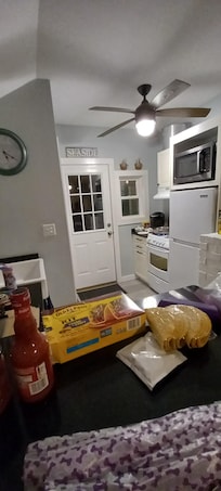 Kitchen and breakfast bar with stools