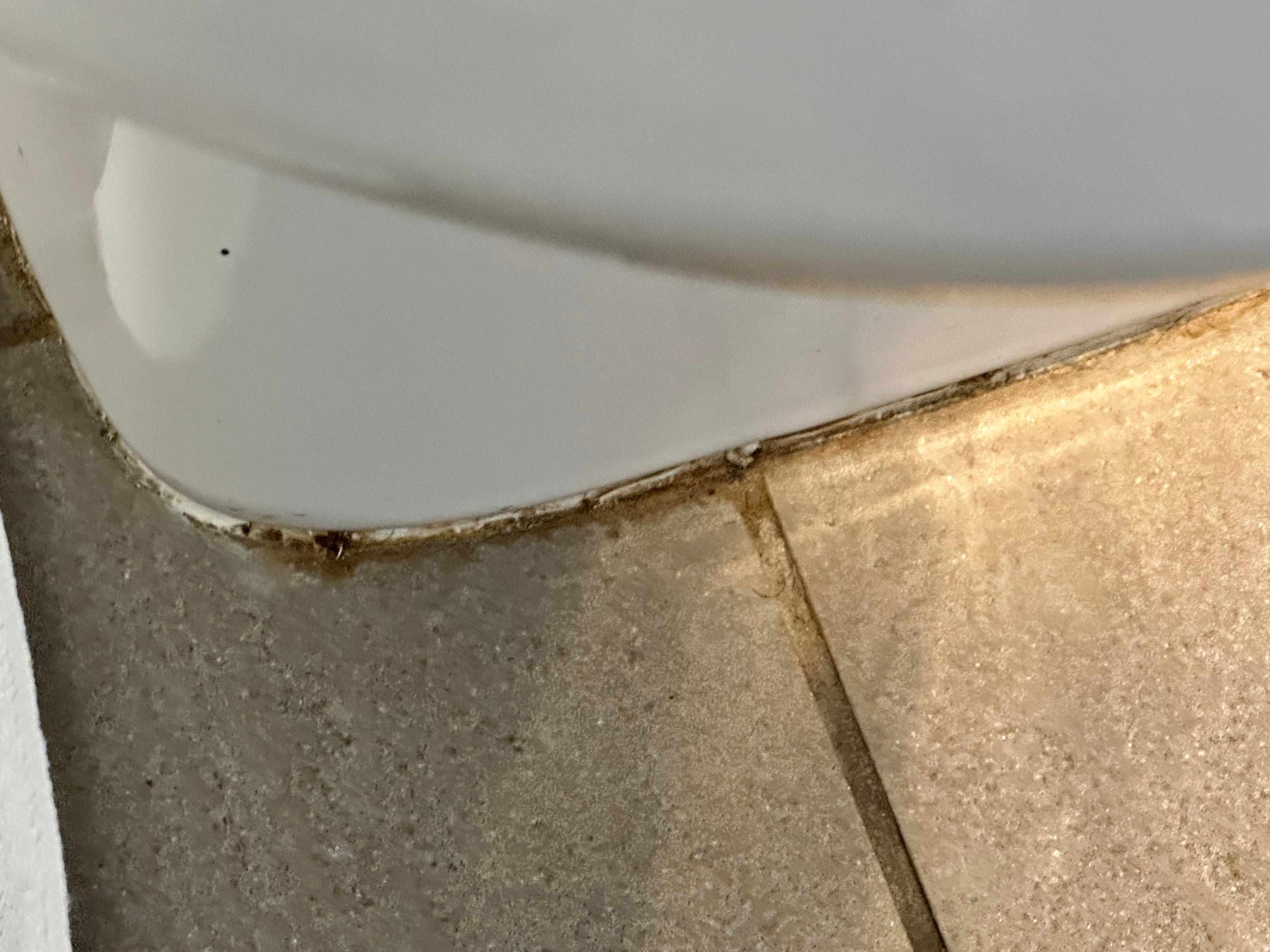 Floor around toilet