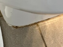 Floor around toilet