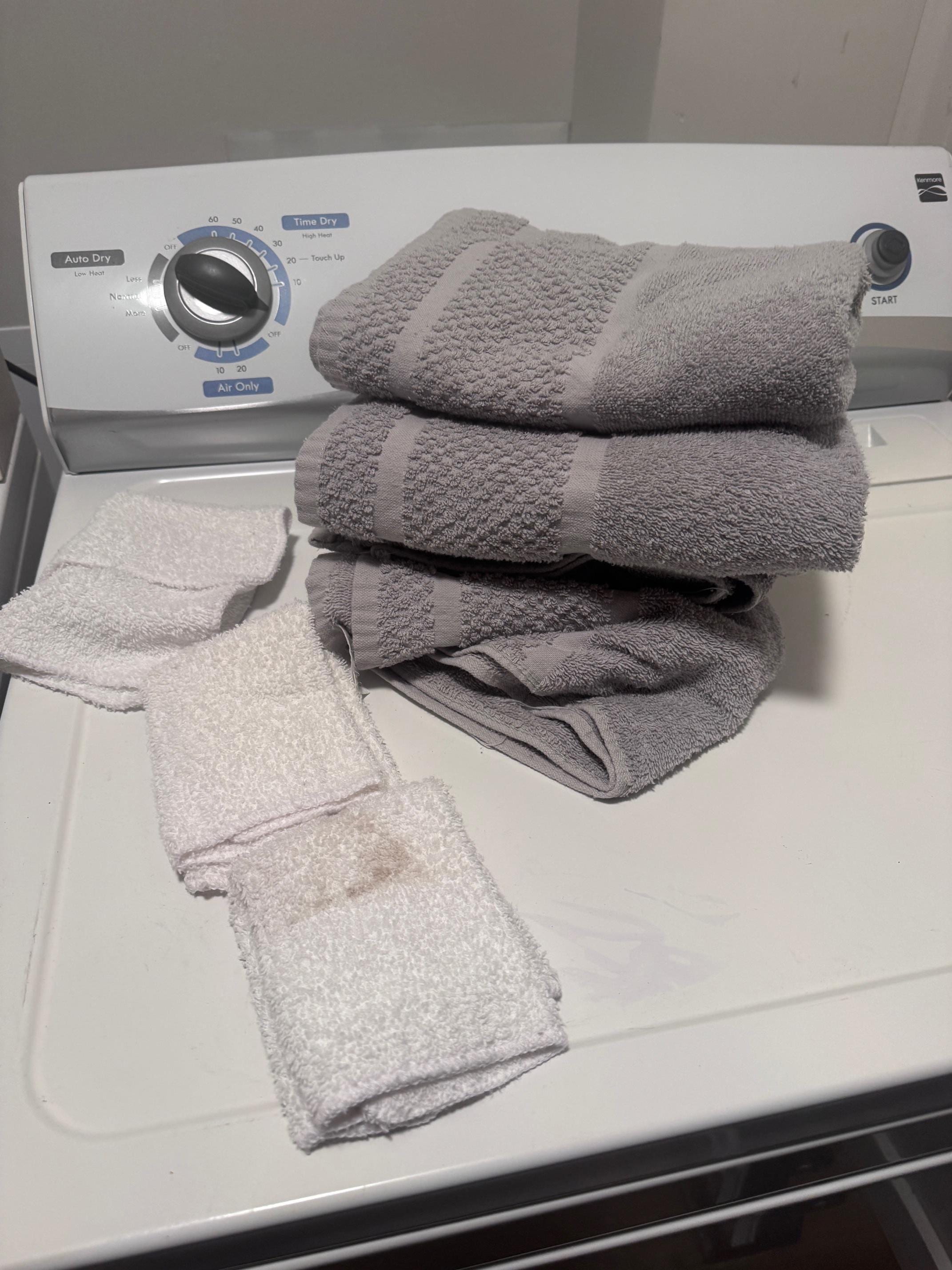 Towels, tattered washcloths and a stained washcloth.