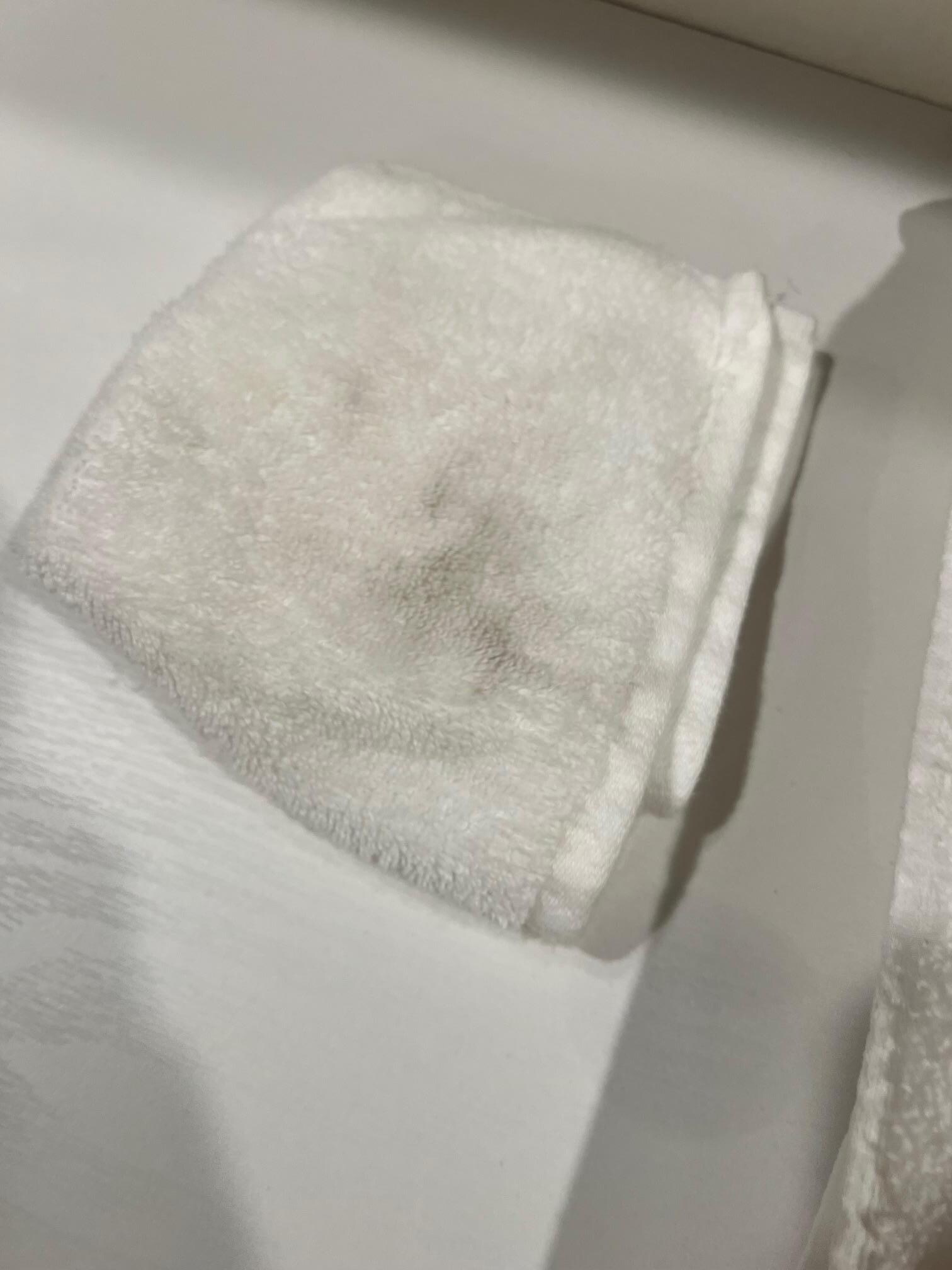 Hand towel with stains