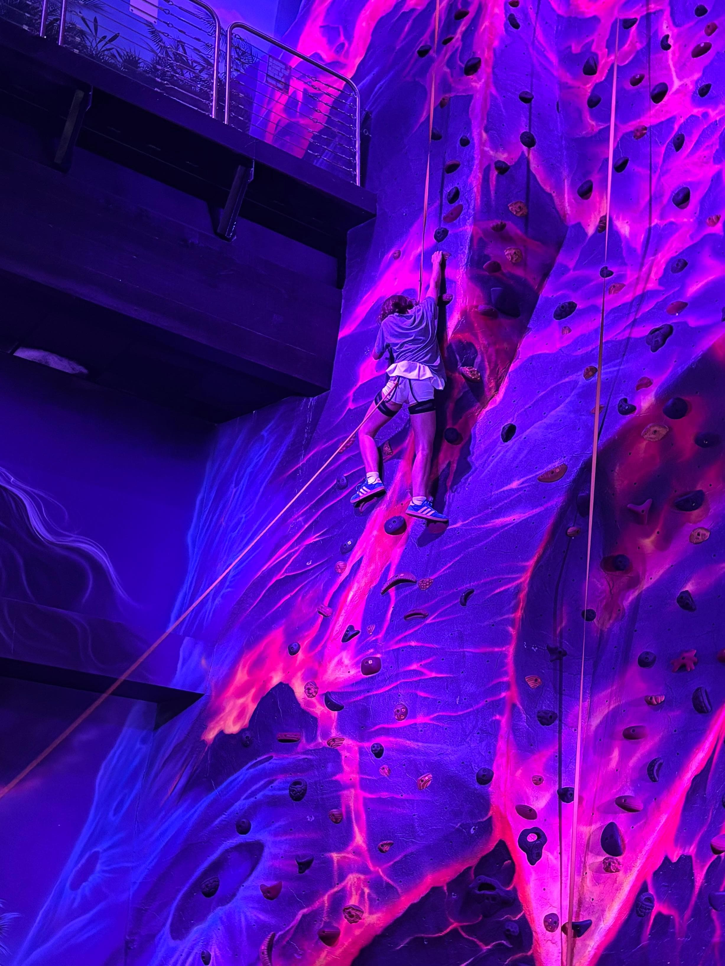 Rock climbing in the arcade 