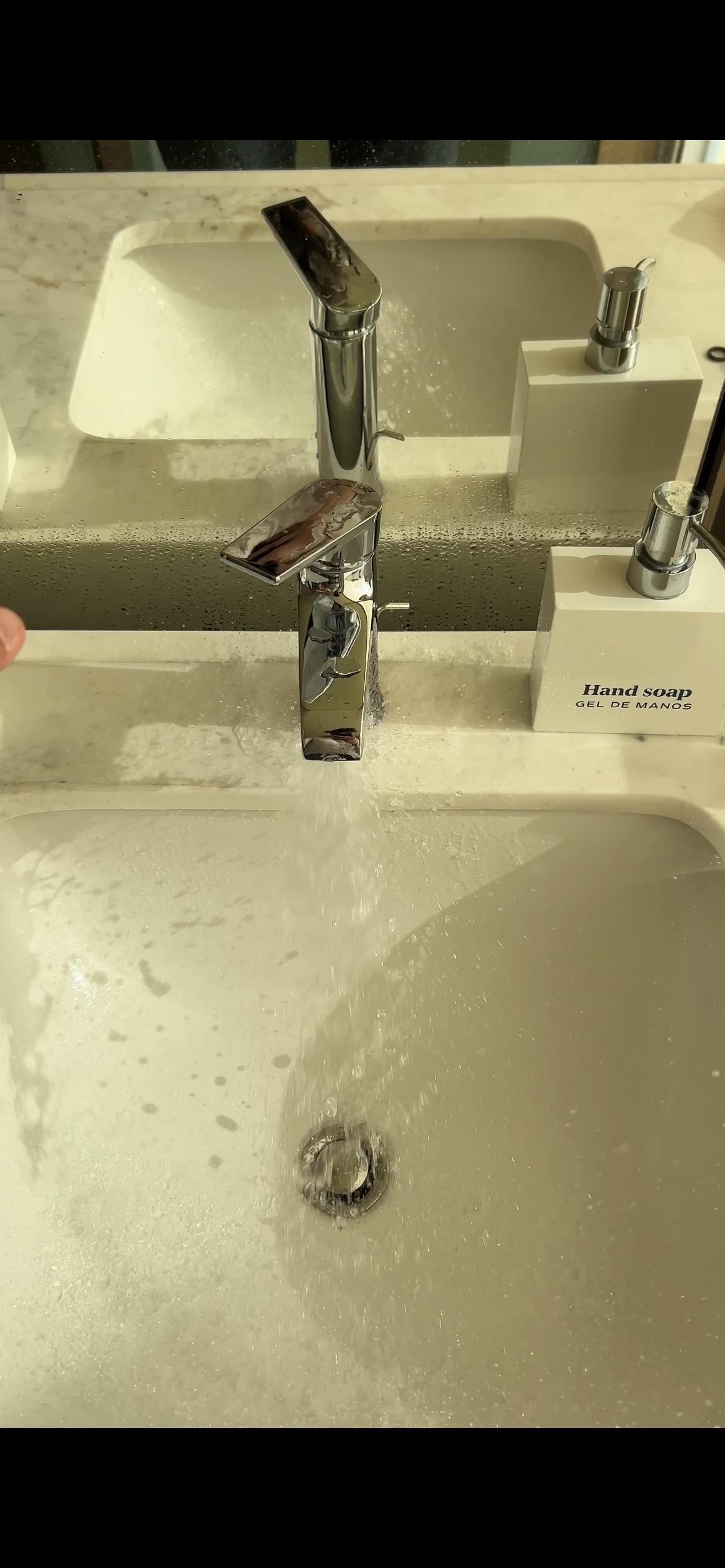 Sink broke and sprayed water everywhere.