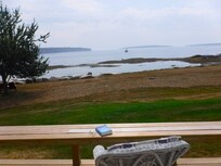 View from the expansive new deck -- watching the fog roll in.