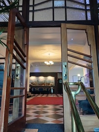 Masonic Art Deco Hotel entry.