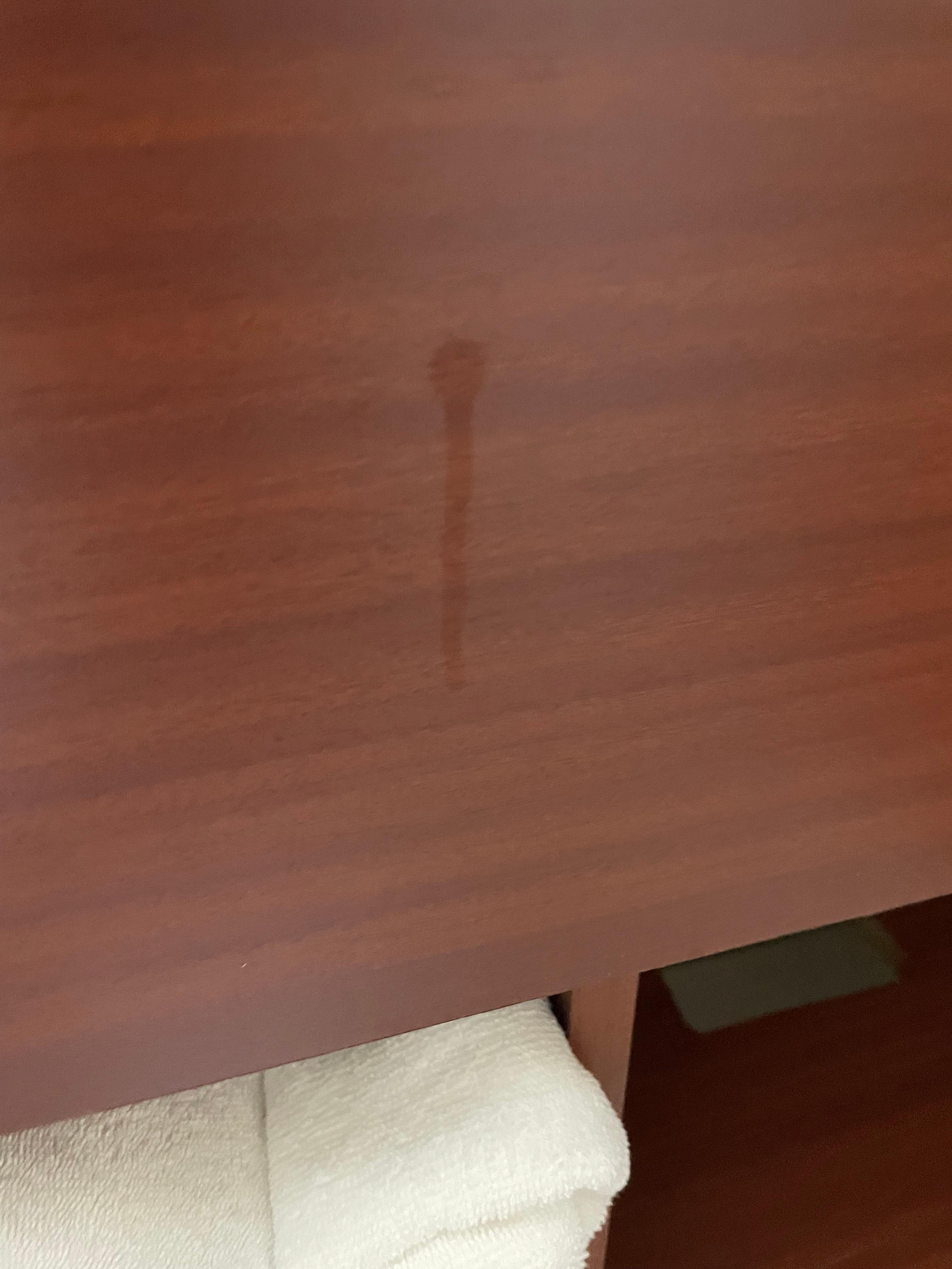 substance on RR sink cabinet 