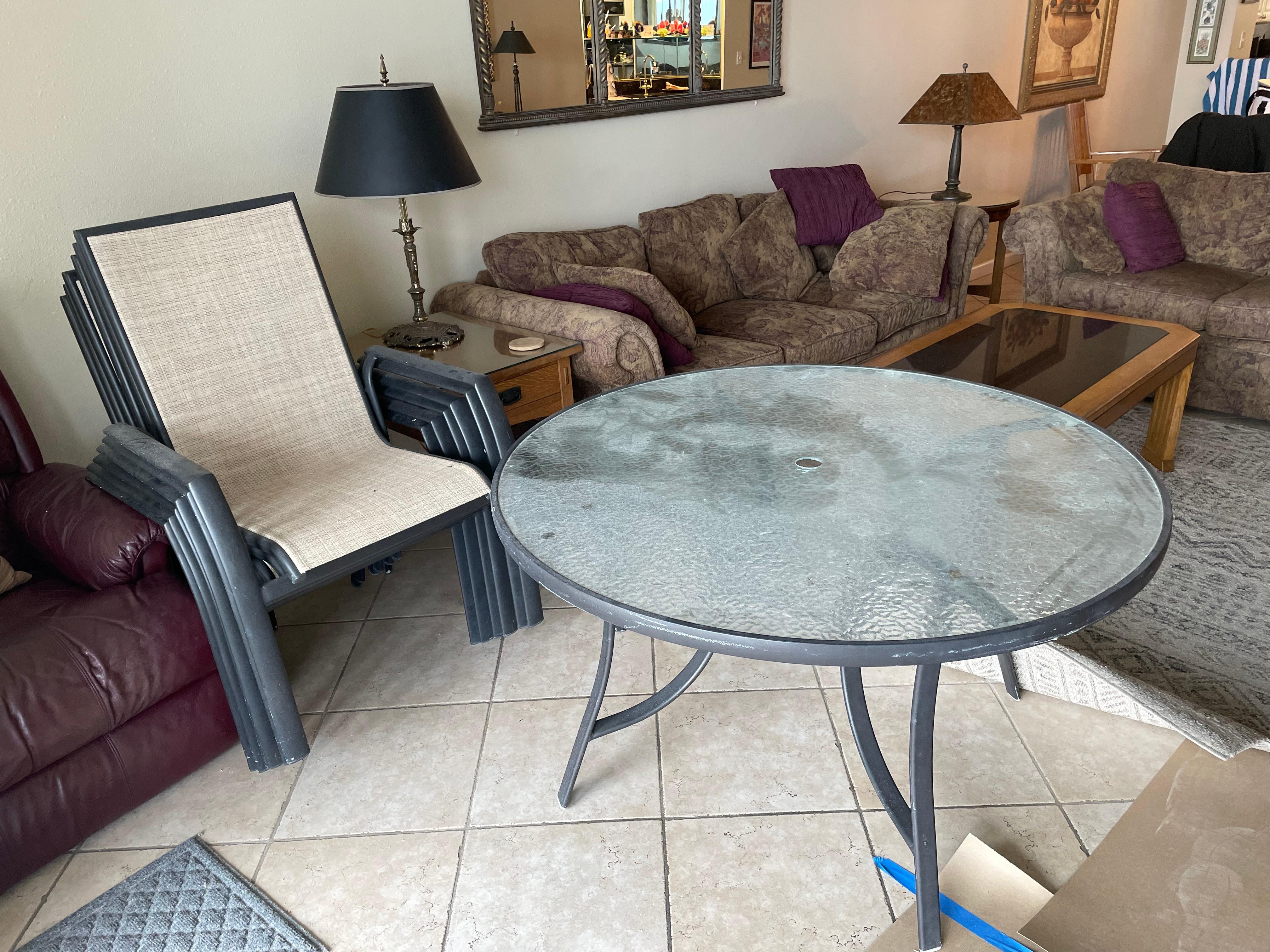Balcony furniture piled in living area