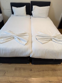 I liked how they put the towels like a bow at the end of the bed.
