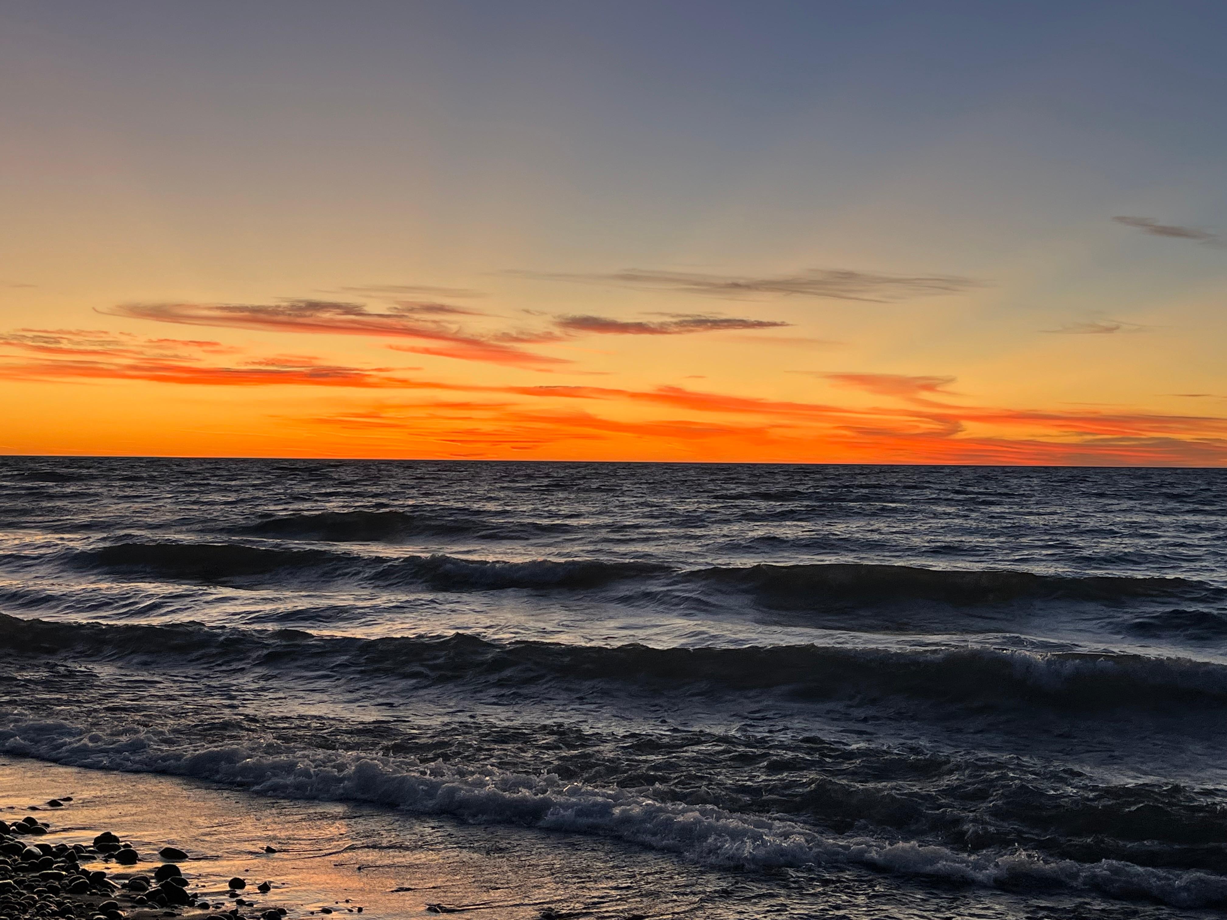 Sunset our last night, a few more waves but so beautiful!