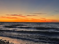 Sunset our last night, a few more waves but so beautiful!