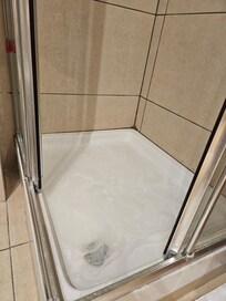 Shower did not drain properly. It was half full of water by the end of each shower.
