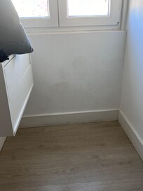 mould and discolored drywall in bedroom
