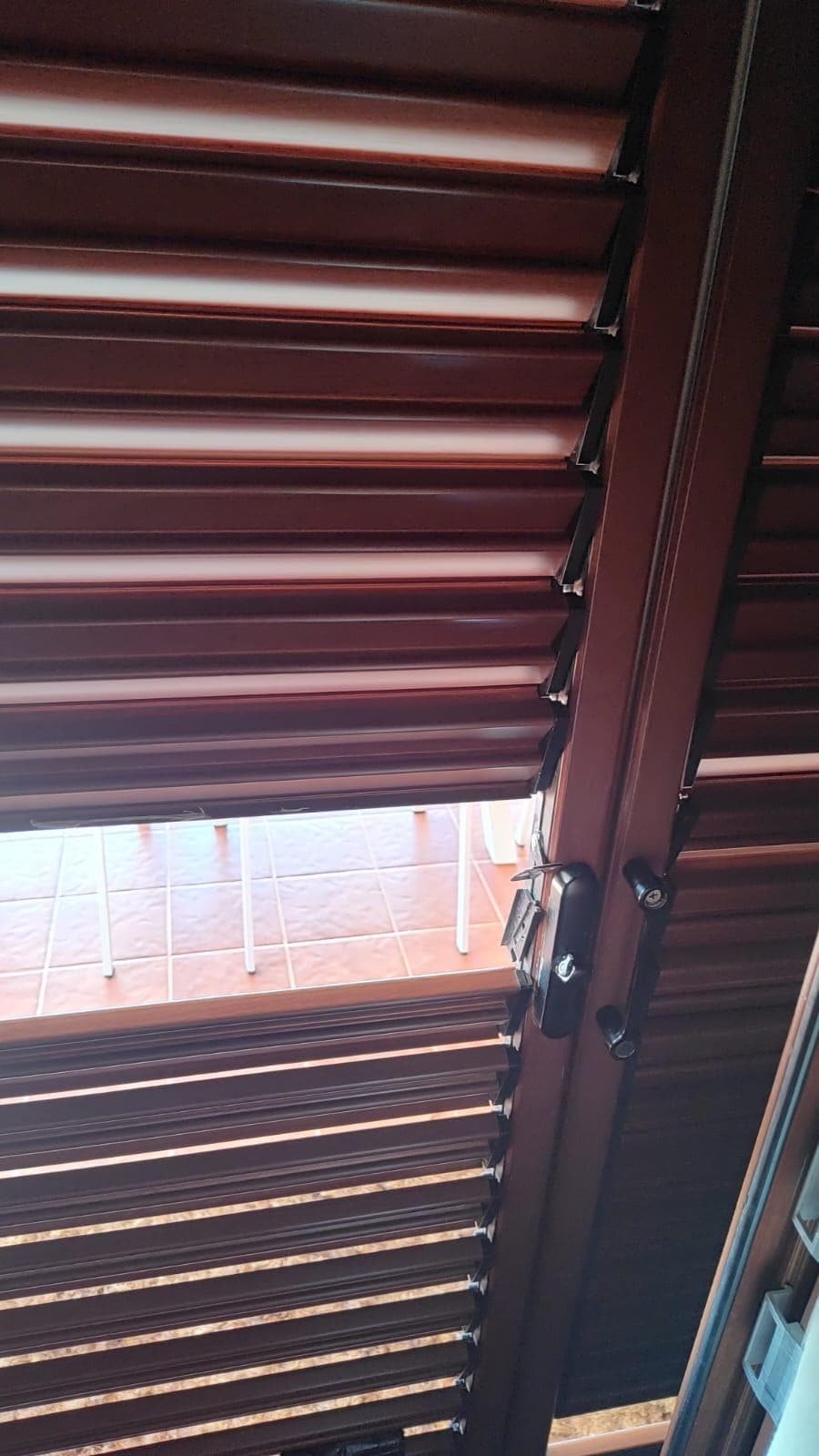 More damaged shutters at areas where door handles are located