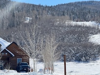 Corner of house and
View of ski slope