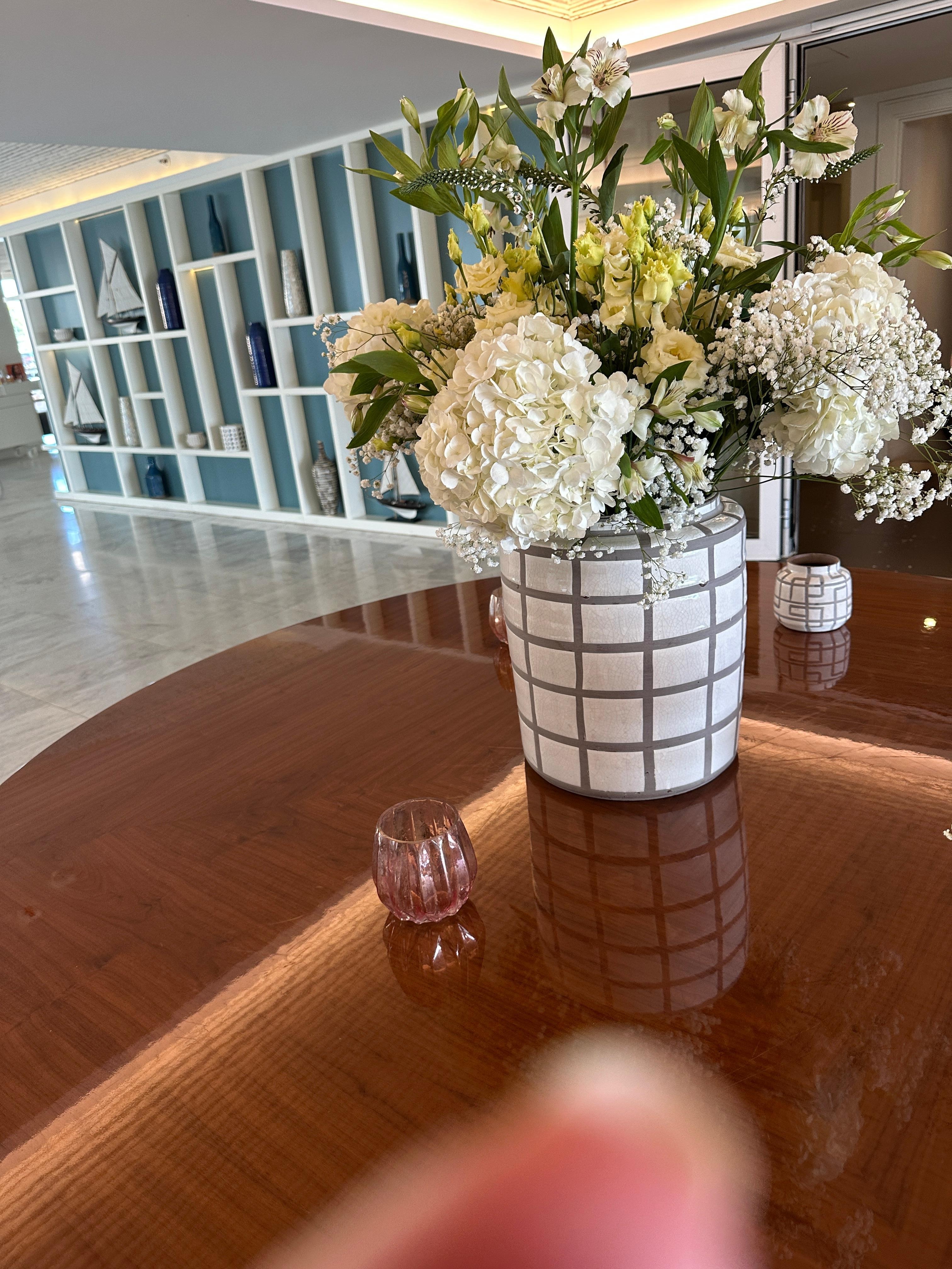 Beautiful fresh flowers in the entrance area