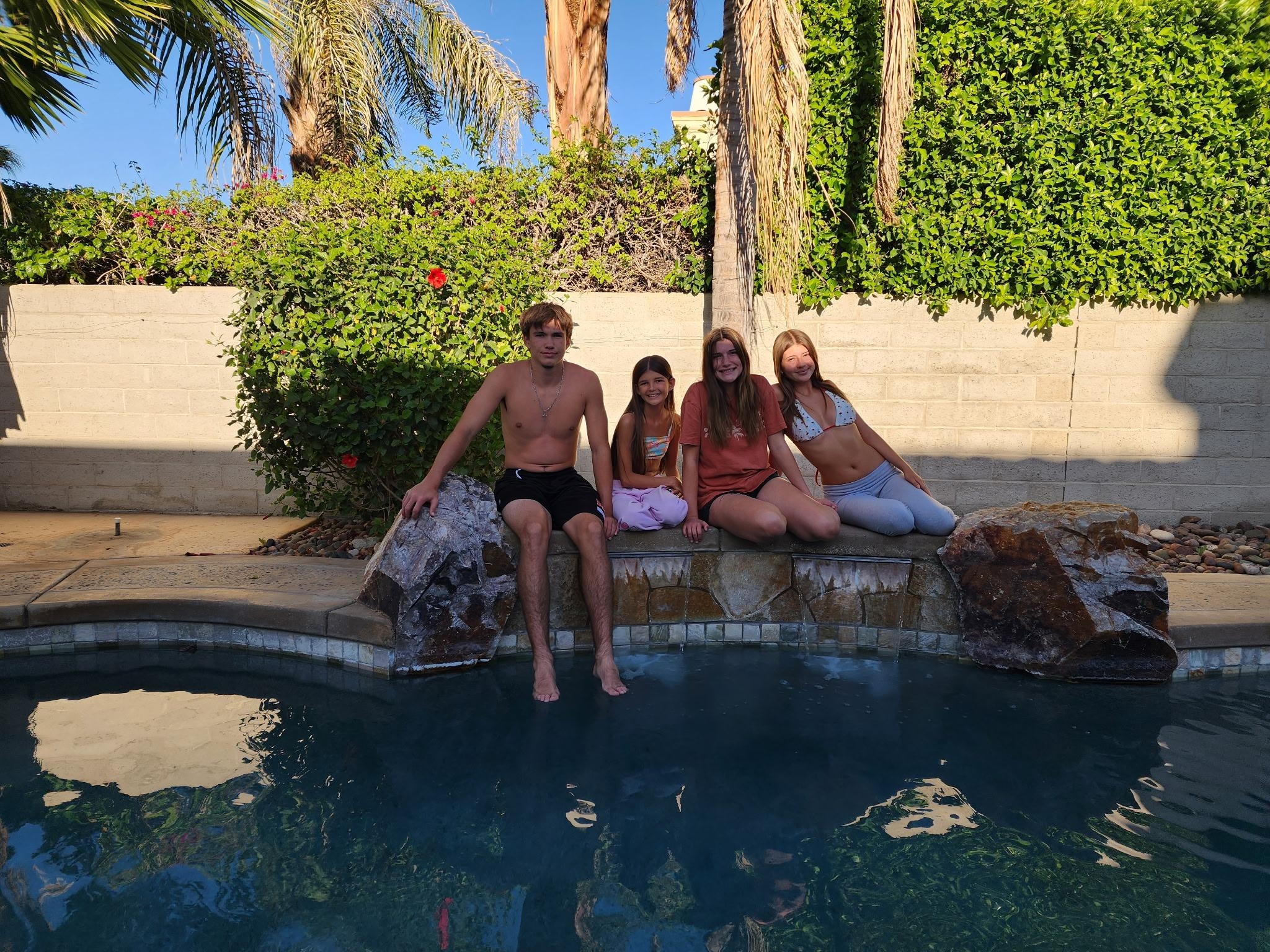 Kids photo over the waterfall.