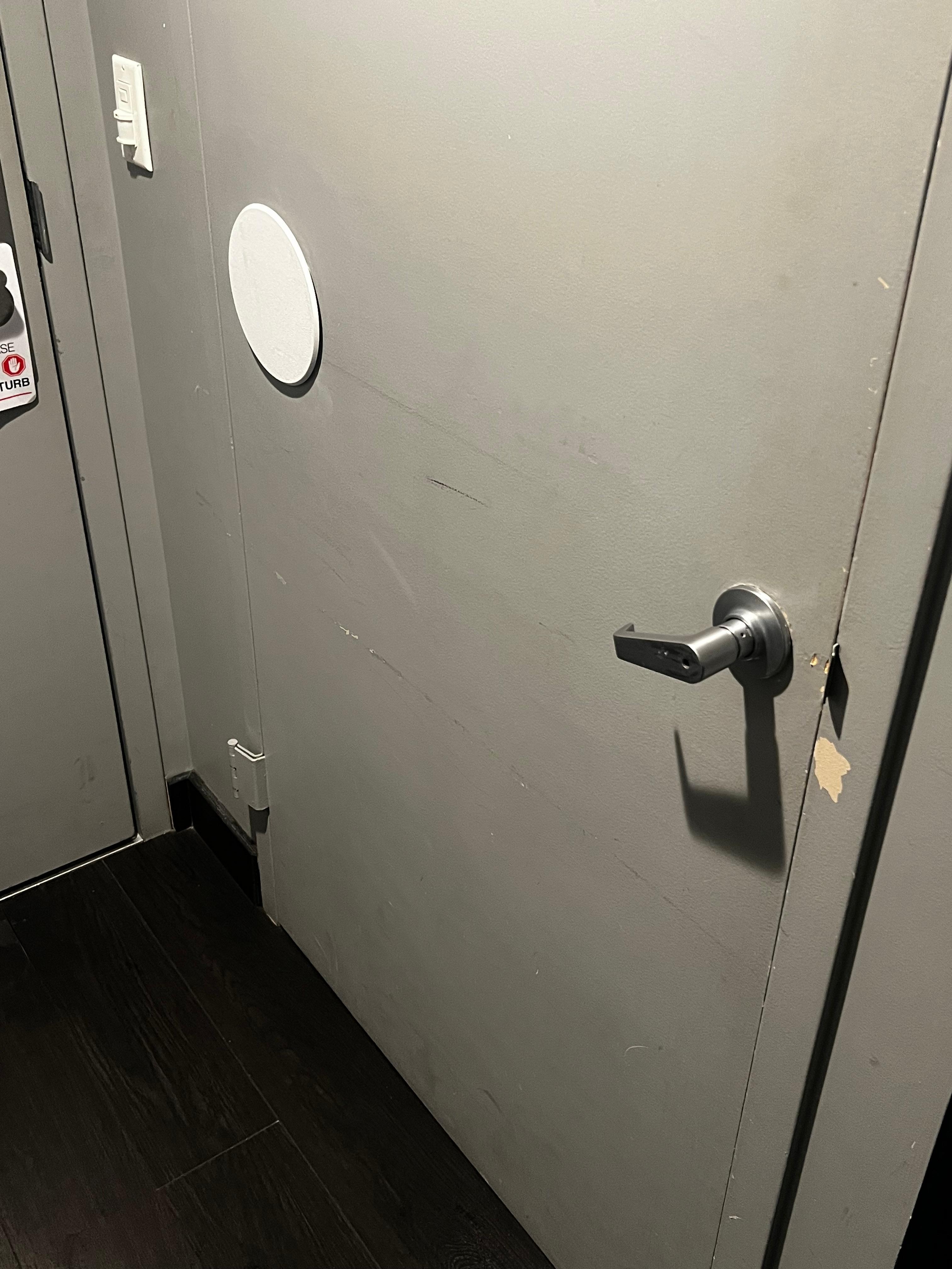 Walls and doors are dirty and scratched 