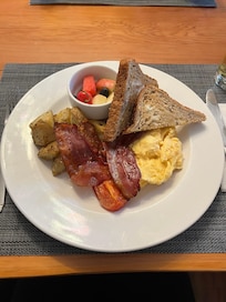 The breakfast! Delicious! Hot and ready to go! 10/10. The cherries were from a tree on the property.