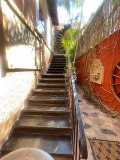 Easy stairs up to the second floor, wrapped in beautiful foliage. A peaceful little climb that adds to the charm of this boutique hotel.