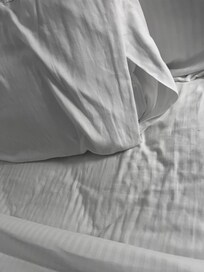 Hair on the pillows and sheets