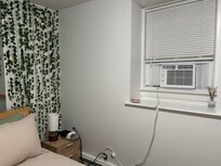 This room is 1/2 a story below ground and is cooled by a window unit. It did a good job.