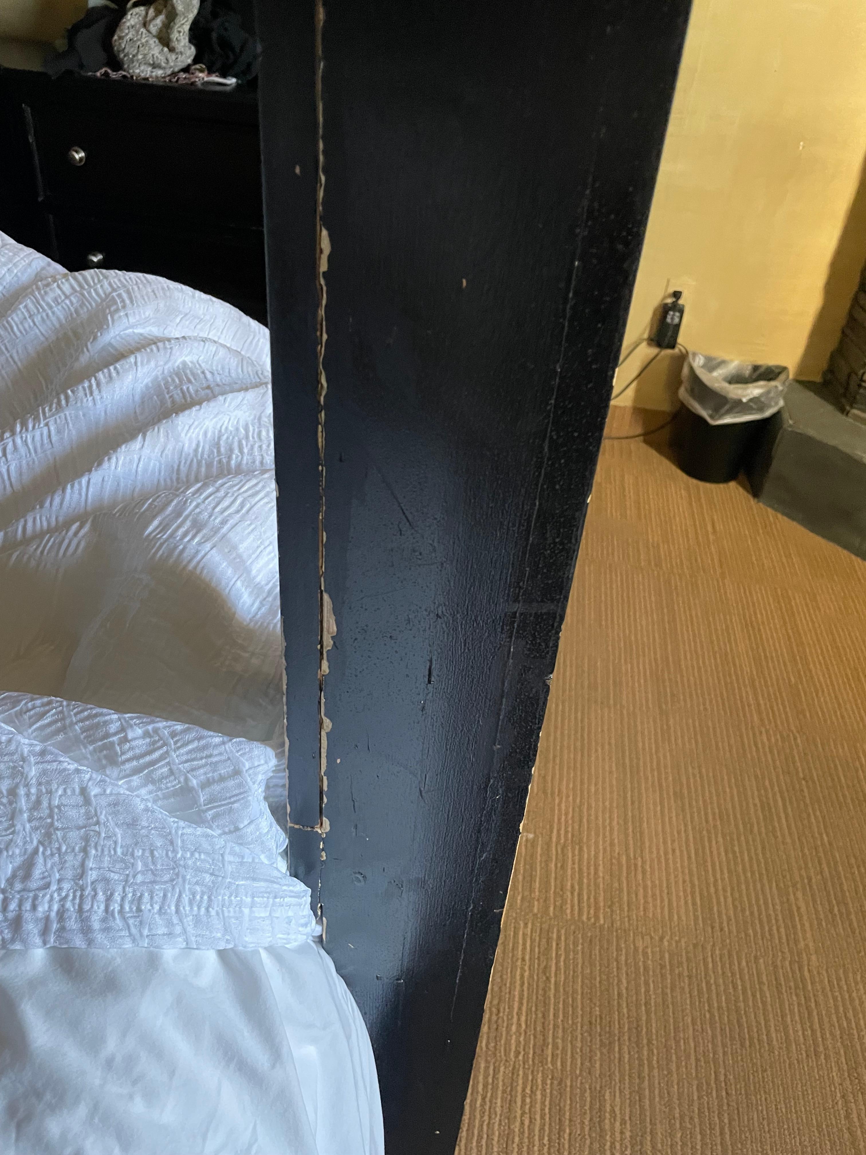 worn veneer on bed frame